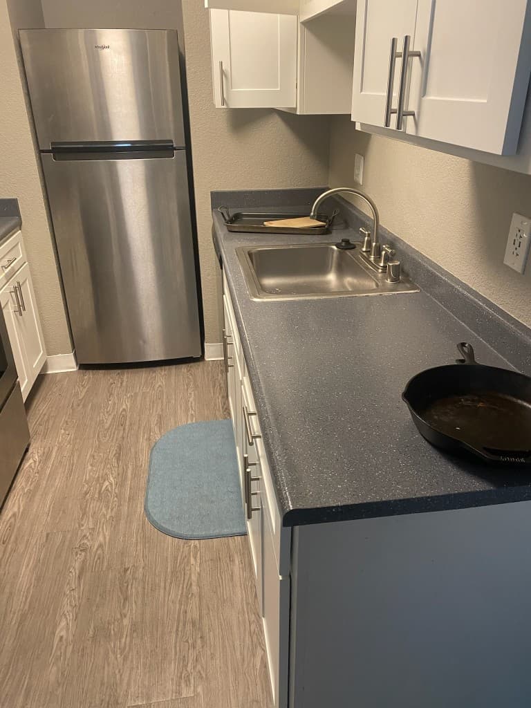 Kitchen refrigerator for eco-certified disposal by JC Junk Hauling