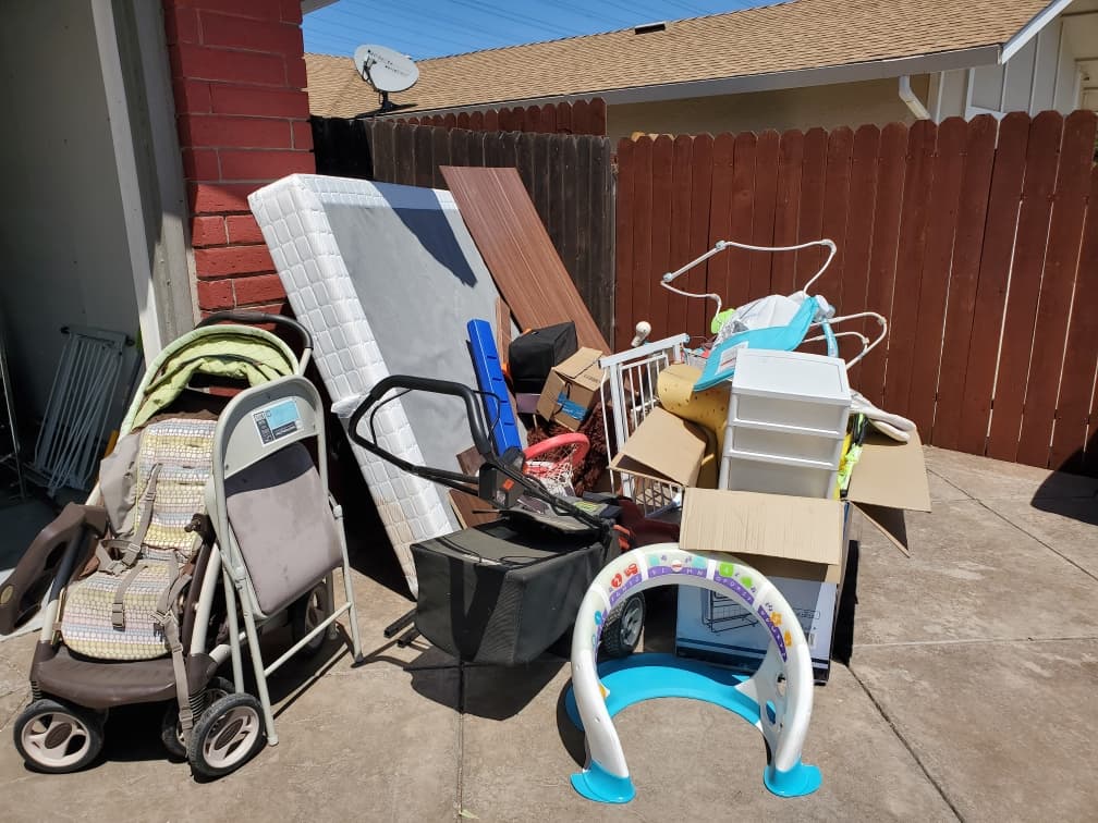 Cardboard boxes and debris removed by JC Junk Hauling