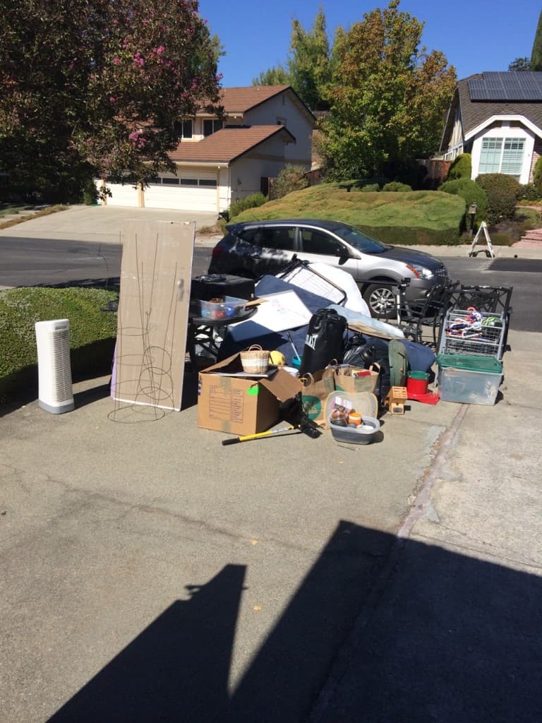 Large pile of junk and household items ready for removal by JC Junk Hauling