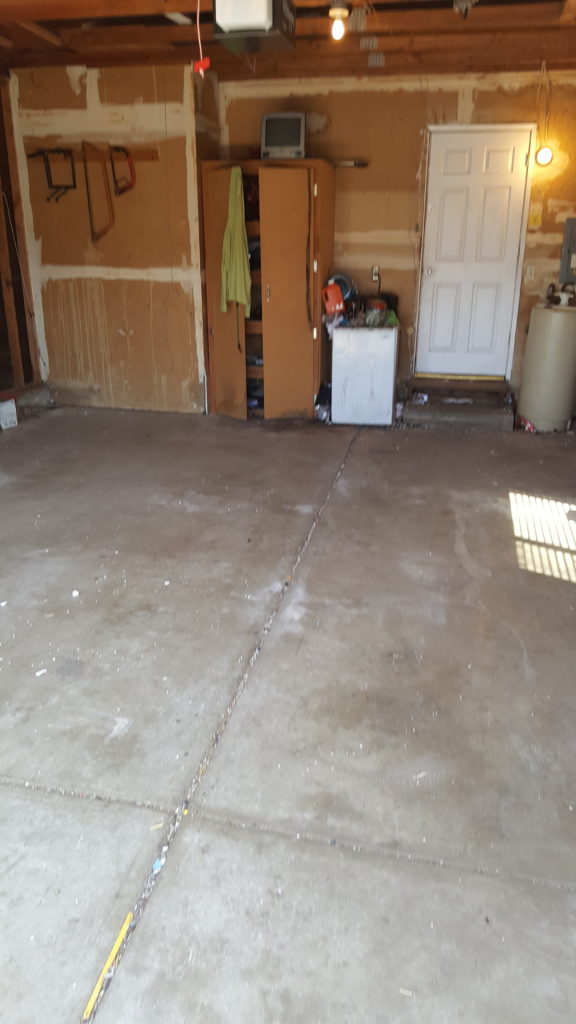 Clean empty garage after JC Junk Hauling cleanout